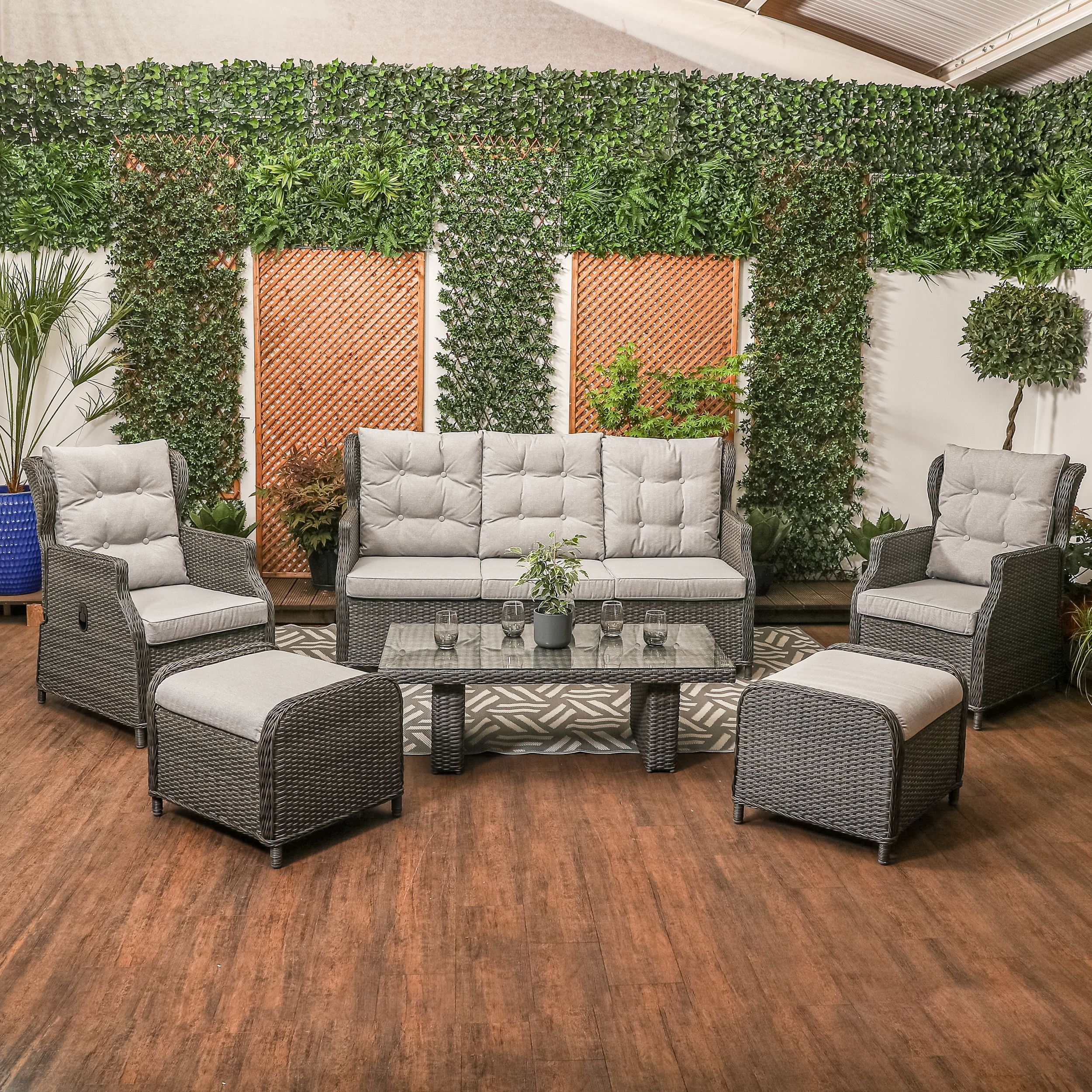 Rattan discount reclining sofa