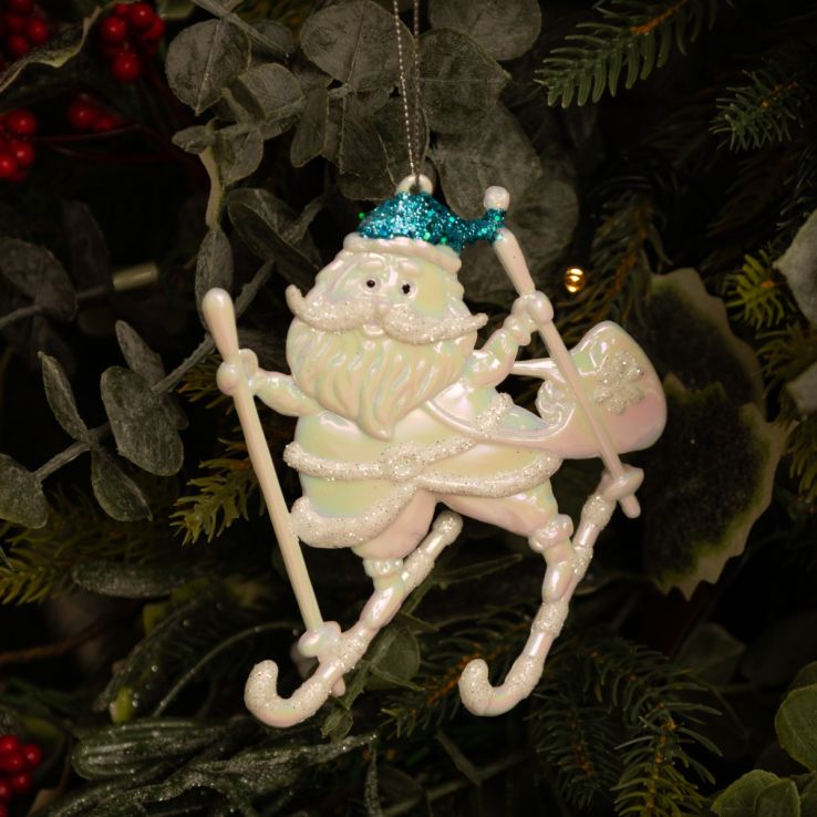 White Iridescent Skiing Santa with Blue Hat - Christmas Tree Decoration main product photo