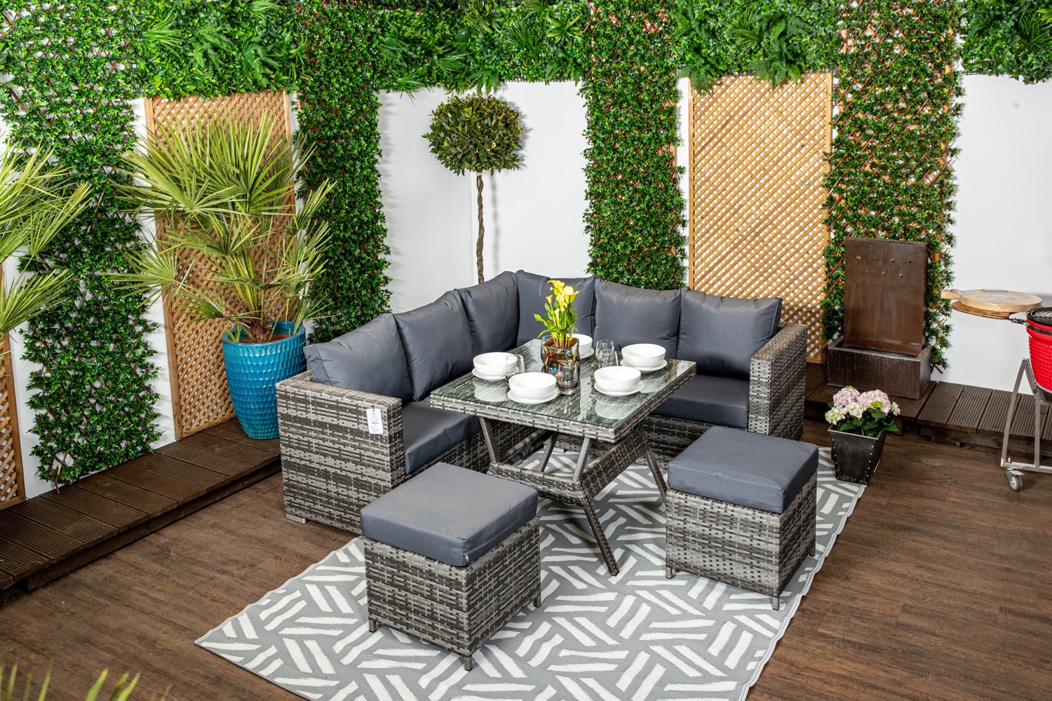 Compact Grey Rattan Corner Sofa Set with Glass Topped Dining